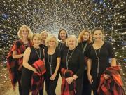 Poinsettias and Prosecco at the Burden Center 11-19-25